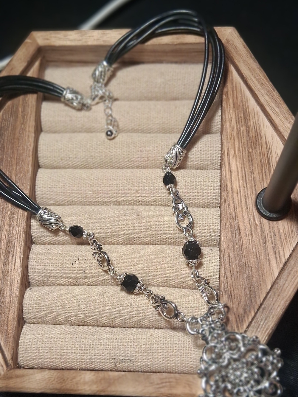 Black Multi-Strand Necklace with Silver Filigree Pendant